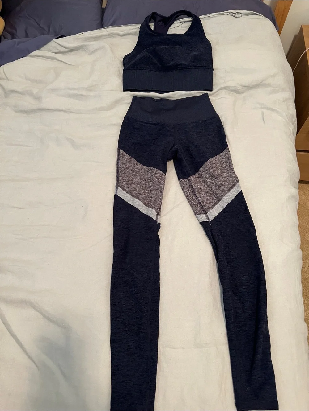 Alo Yoga navy blue bra and legging set